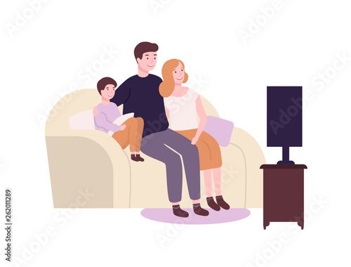 Cute funny family sitting on couch or sofa and watching TV, movie or film