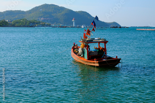Fishing boat and blue sea at Koh si chang island in Thailand