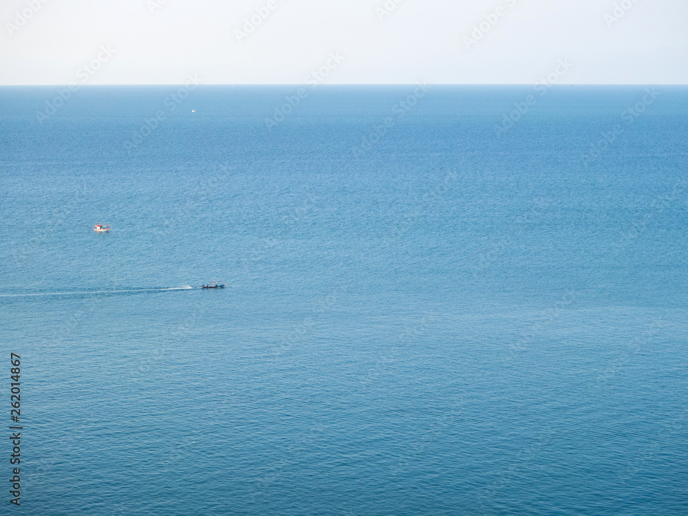 Fototapeta premium Motor boat on the surface of the sea near the island. Koh Phangan. Thailand