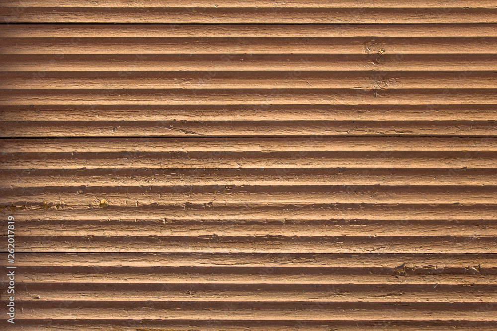 old gray brown beige wavy wooden surface with peeling paint and horizontal lines with shadows. rough texture old gray brown beige wavy wooden surface with peeling paint and horizontal lines with shadows. rough texture
