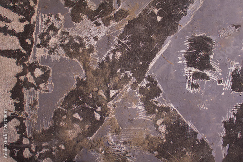 old dirty gray blue wall with black white spots of paint and scratches. rough surface texture