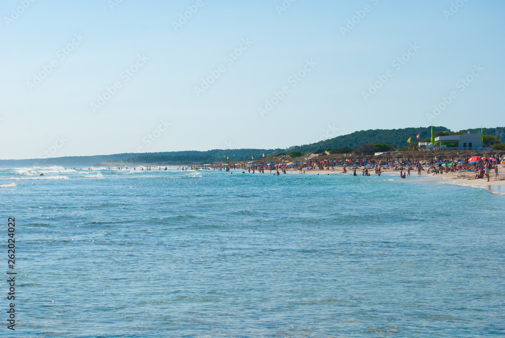 Crowded sand beach of Minorca island