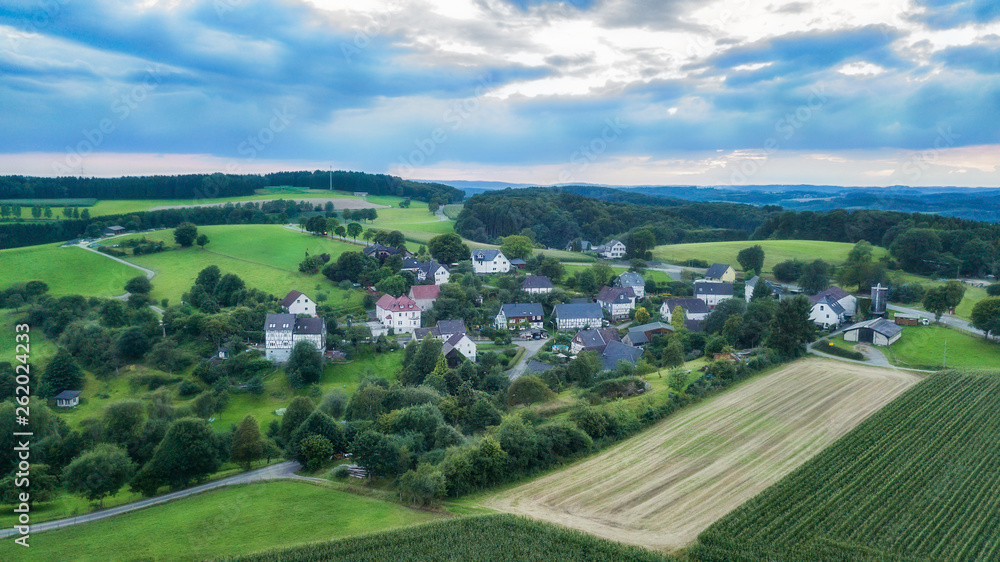 Aerial view of Schemmerhausen, a small village in the county of Reichshof in Germany. Aerial view of Schemmerhausen, a small village in the county of Reichshof in Germany.