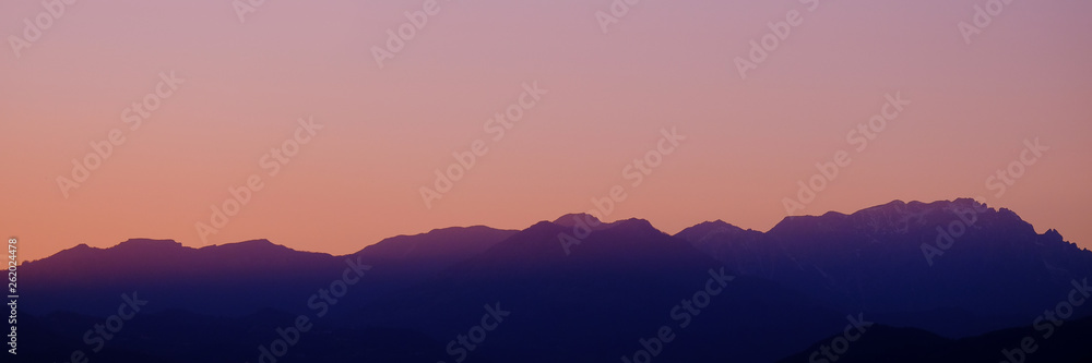 Skyline during the sunset of the Mountains Alps from Vicenza, April 2019