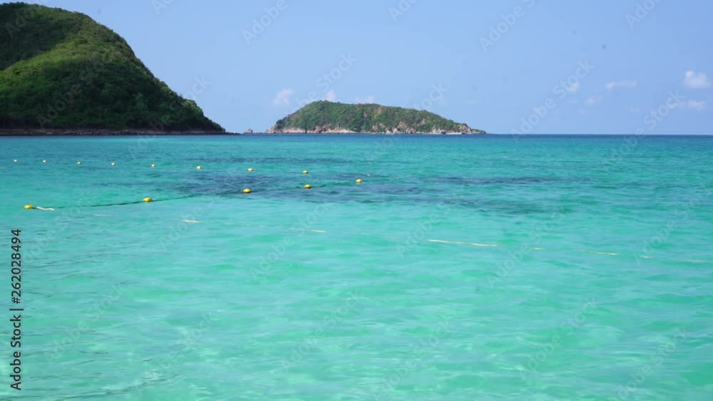 Holiday relaxing vacation beach concept. Beautiful view tropical island of sea at Samsarn Island Sattahip, Thailand. Nature of blue clean ocean sea beach with summer sky clear view landscape. Holiday relaxing vacation beach concept. Beautiful view tropical island of sea at Samsarn Island Sattahip, Thailand. Nature of blue clean ocean sea beach with summer sky clear view landscape.