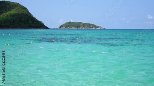 Holiday relaxing vacation beach concept. Beautiful view tropical island of sea at Samsarn Island Sattahip, Thailand. Nature of blue clean ocean sea beach with summer sky clear view landscape.  photo