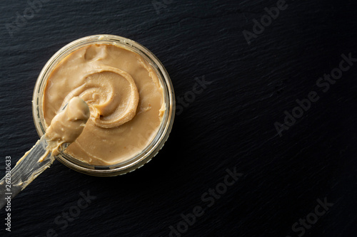 Peanuts and Fresh Peanut Butter Isoalted Black Background Protein Super Food Snack with copy space