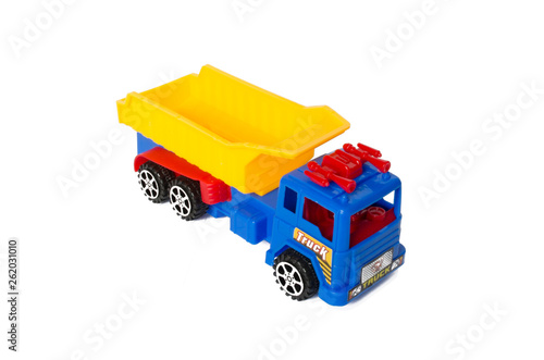 toy trick truck for kids on a white isolated background. machine with a red body photo