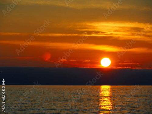 Fototapeta Naklejka Na Ścianę i Meble -  Sun falling into the sea of Rumoi