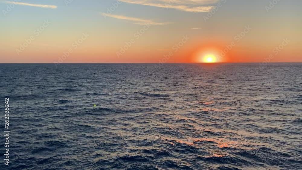 Beautiful golden sunrise over the Gulf of Mexico ocean with copy space Beautiful golden sunrise over the Gulf of Mexico ocean with copy space