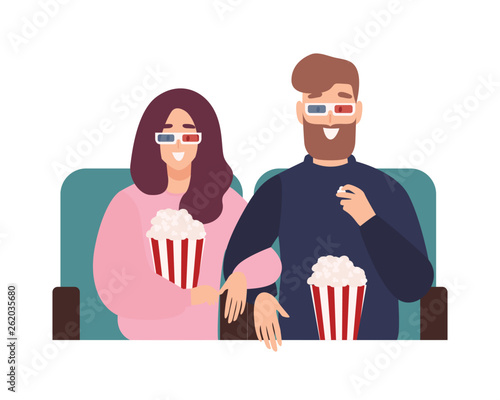 Young man and woman in 3d glasses watching film or movie together at cinema theater