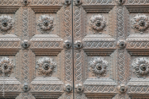 Parma Baptistery wooden gate detail. Color image
