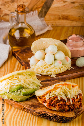 Various types of arepas with different fillings, Latin American food