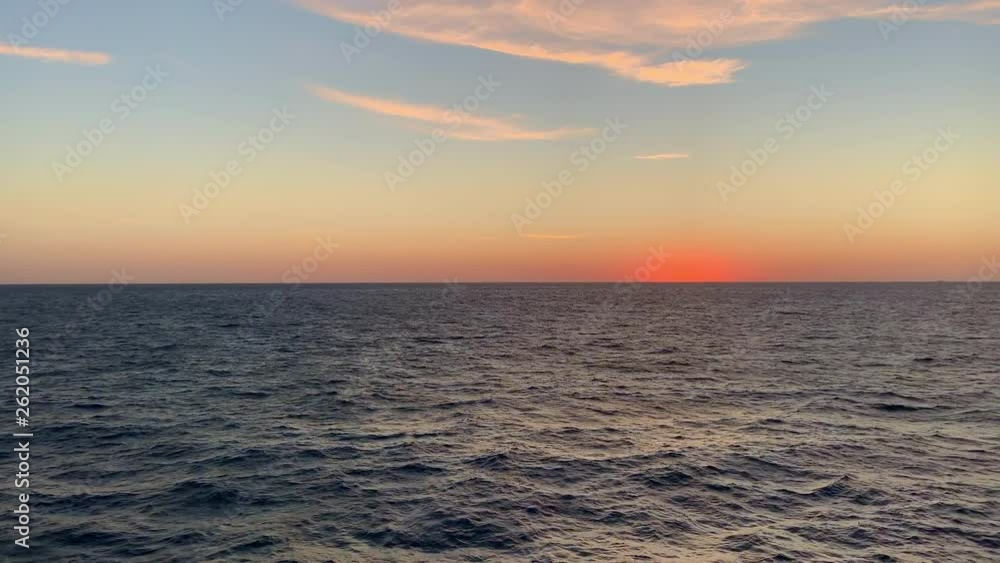 Beautiful golden sunrise over the Gulf of Mexico ocean with copy space Beautiful golden sunrise over the Gulf of Mexico ocean with copy space