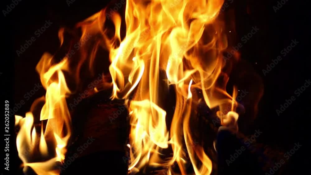 Orange flame in the fireplace. Fire as a beautiful background or backdrop. Orange flame in the fireplace. Fire as a beautiful background or backdrop.