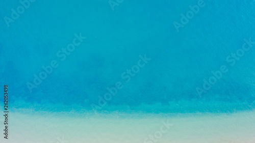 Shade emerald blue water and wave foam on tropical sea © Naypong Studio