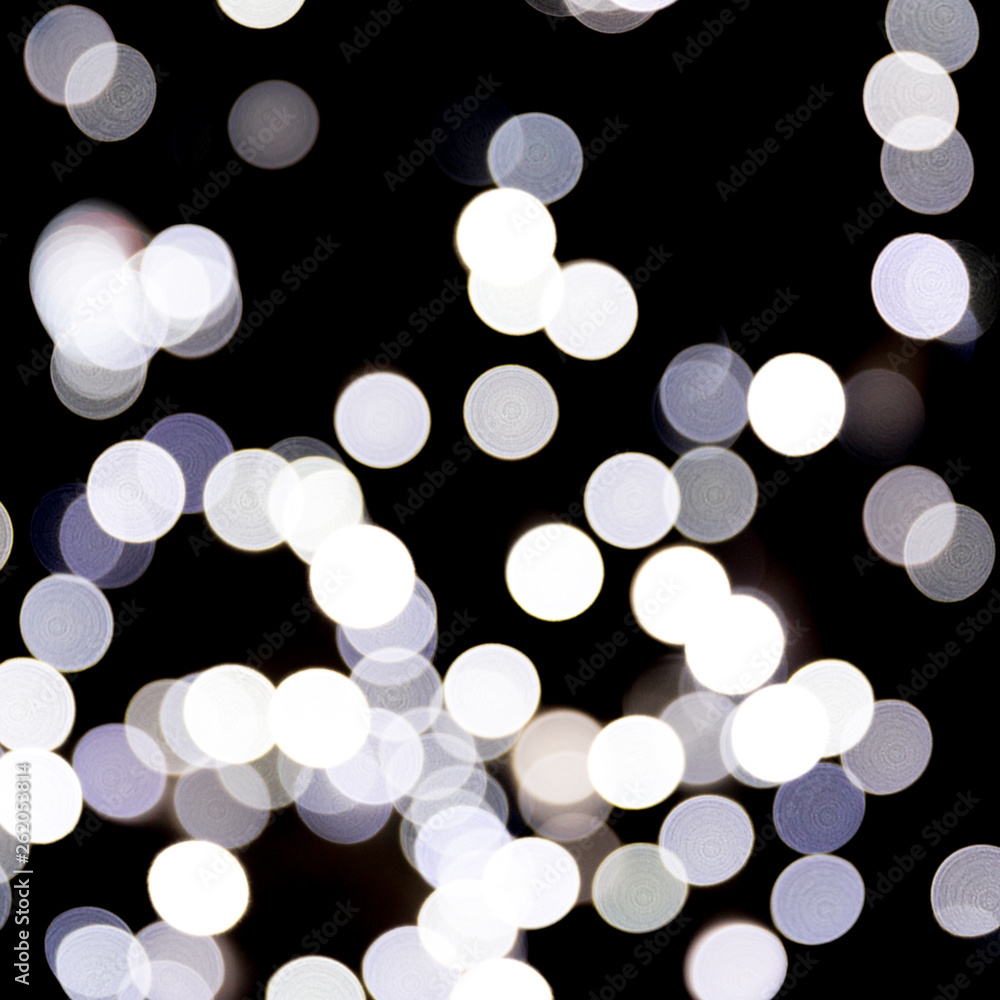 Abstract bokeh of white city lights on black background. defocused and blurred many round light Abstract bokeh of white city lights on black background. defocused and blurred many round light