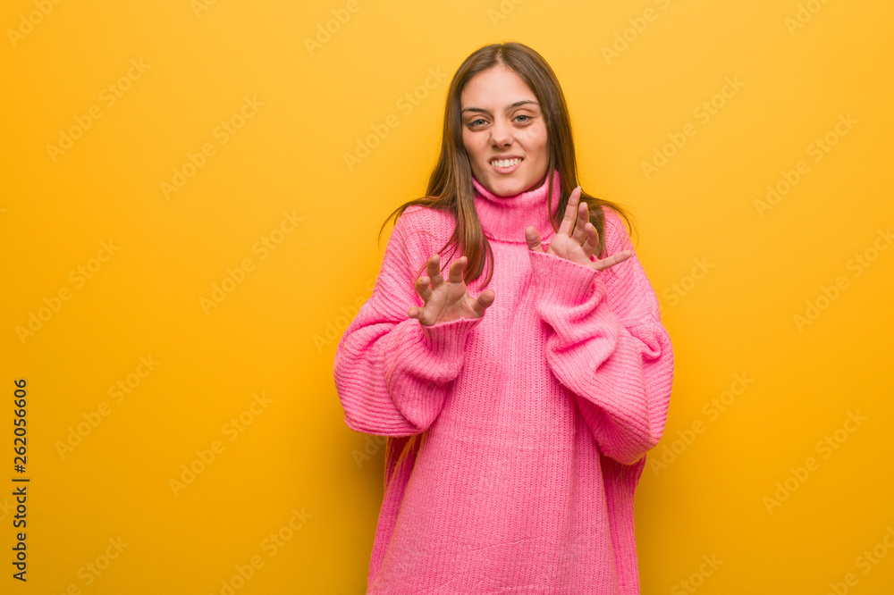 Young modern woman rejecting something doing a gesture of disgust Young modern woman rejecting something doing a gesture of disgust