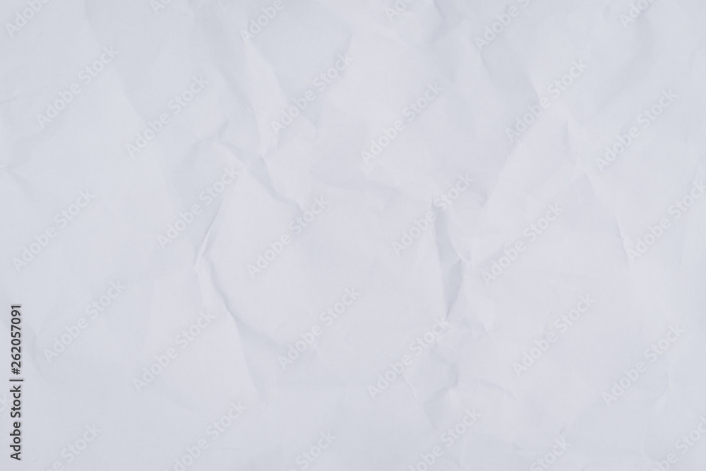 Obraz premium Crumpled white paper background and texture