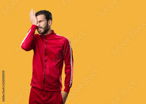 Young fitness man forgetful  realize something
