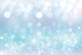 Abstract festive light blue silver bokeh background with colorful circles and stars. Beautiful texture.