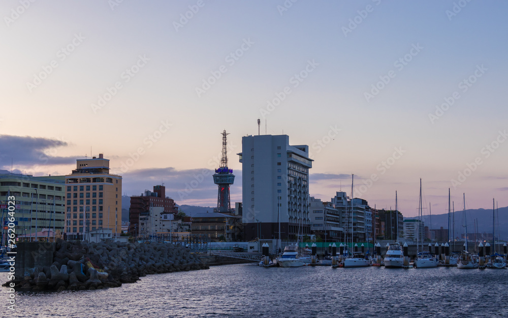 Beppu Harbor and City Skyline in the evening. Beppu, Oita Prefecture, Japan, Asia. Beppu Harbor and City Skyline in the evening. Beppu, Oita Prefecture, Japan, Asia.