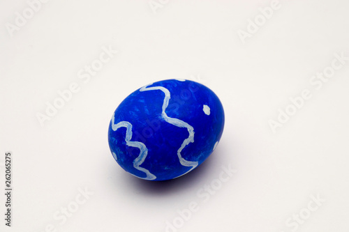 blue Easter egg on white background
