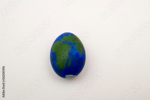 egg decorated in the form of planet earth