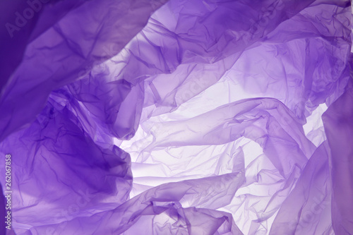 Wallpaper Mural Plastic bag background. Plastic concept. Violet background for designers, mock-ups, invitations, postcards, like canvas for text and congratulation Torontodigital.ca