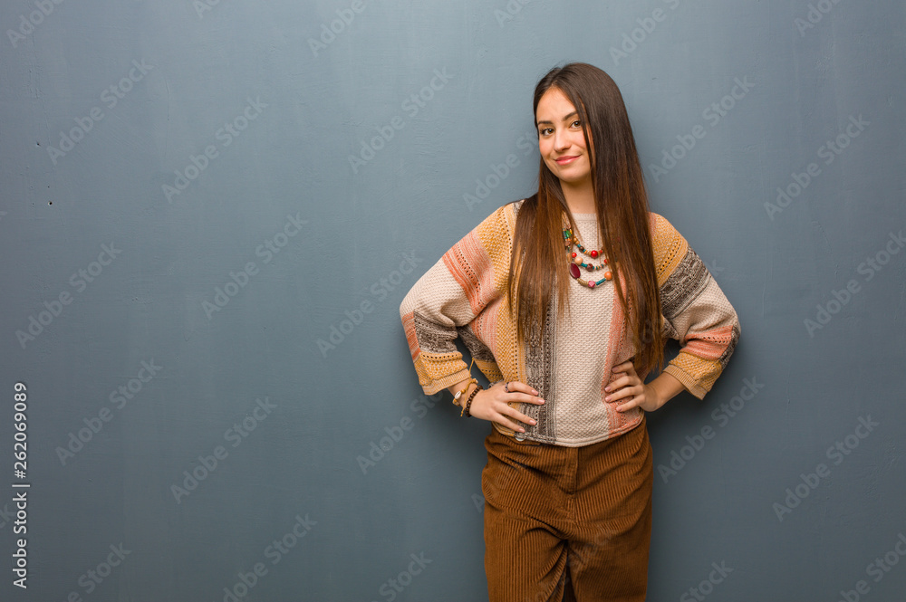 Obraz premium Young hippie woman with hands on hips