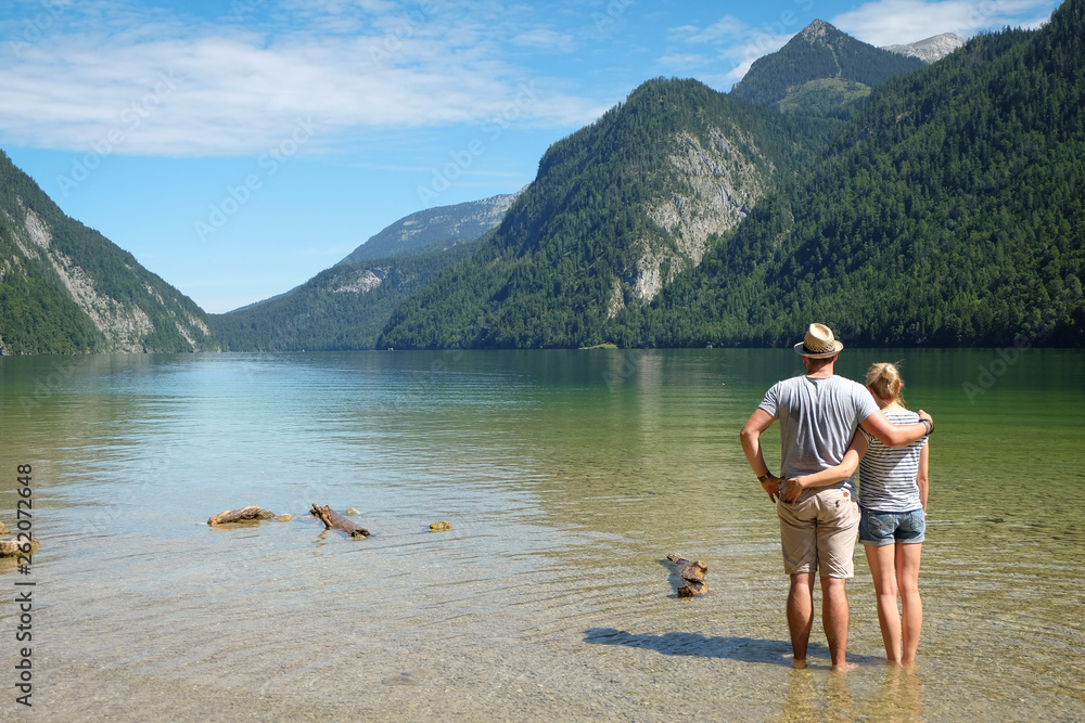 Germany, Bavaria, Koenigssee, couple standing in lake