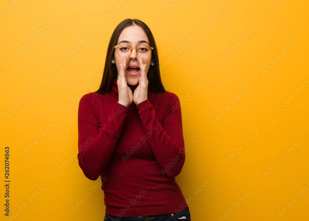 Intellectual young girl shouting something happy to the front Intellectual young girl shouting something happy to the front
