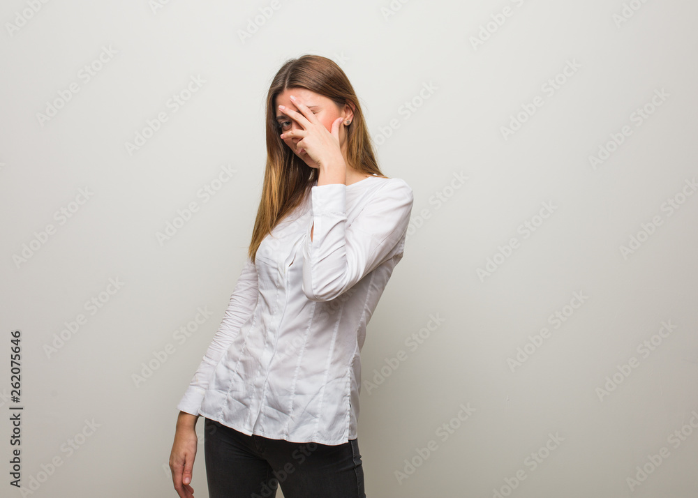Young russian girl embarrassed and laughing at the same time Young russian girl embarrassed and laughing at the same time
