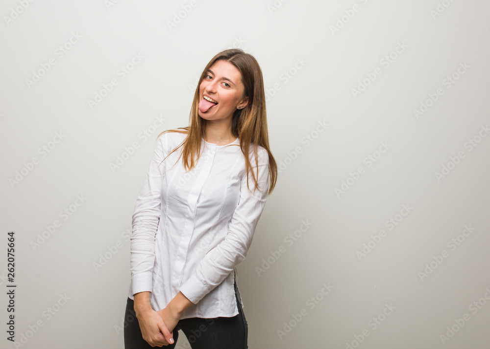 Young russian girl funnny and friendly showing tongue Young russian girl funnny and friendly showing tongue