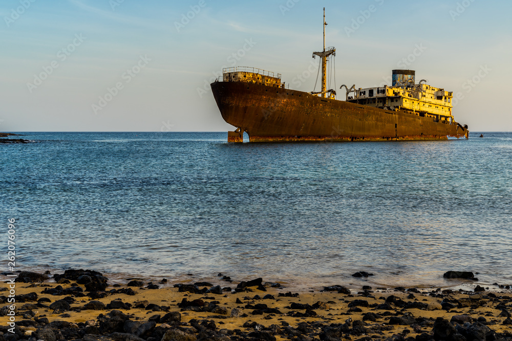 Spain, Lanzarote, Famous shipwreck of temple hall in arrecife bay at sunset