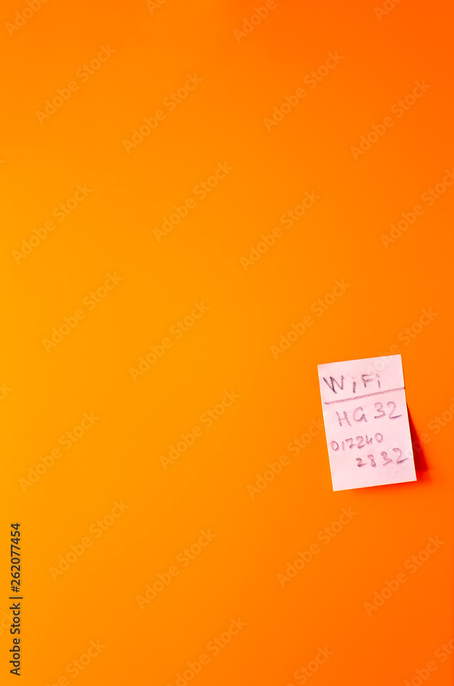 Naklejka premium Note on the orange fridge. Password from the wi-fi network.