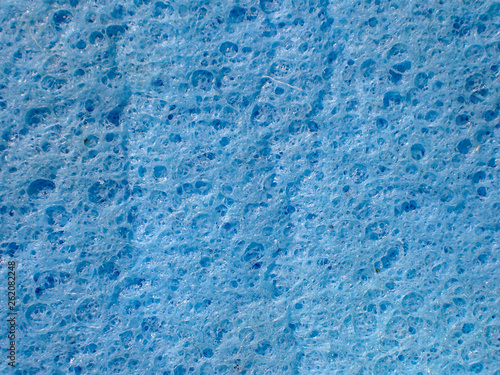Macro close up of blue sponge for washing.Inside of blue sponge for washing. extreme close up