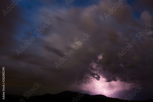 Lightning flashes over north Idaho during a fast moving late spring storm. photo