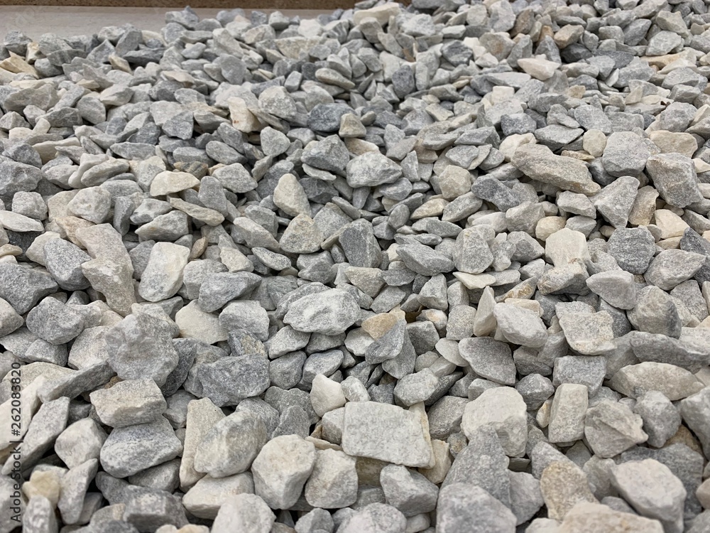 gray small granite crumb, building material, simple background gray small granite crumb, building material, simple background