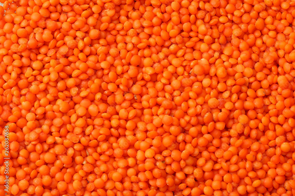 red lentils background. red lentils texture. Top view.