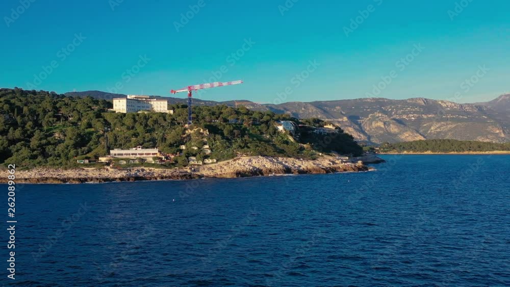 Panoramic slide along the coast line of Cap Ferrat, France into the gulf of Saint Hospice with the view to the viaduct on the road from Nice to Monako Panoramic slide along the coast line of Cap Ferrat, France into the gulf of Saint Hospice with the view to the viaduct on the road from Nice to Monako