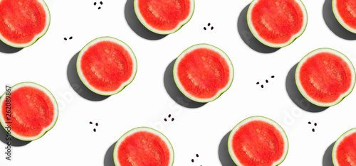 Sliced watermelons arranged on a white background