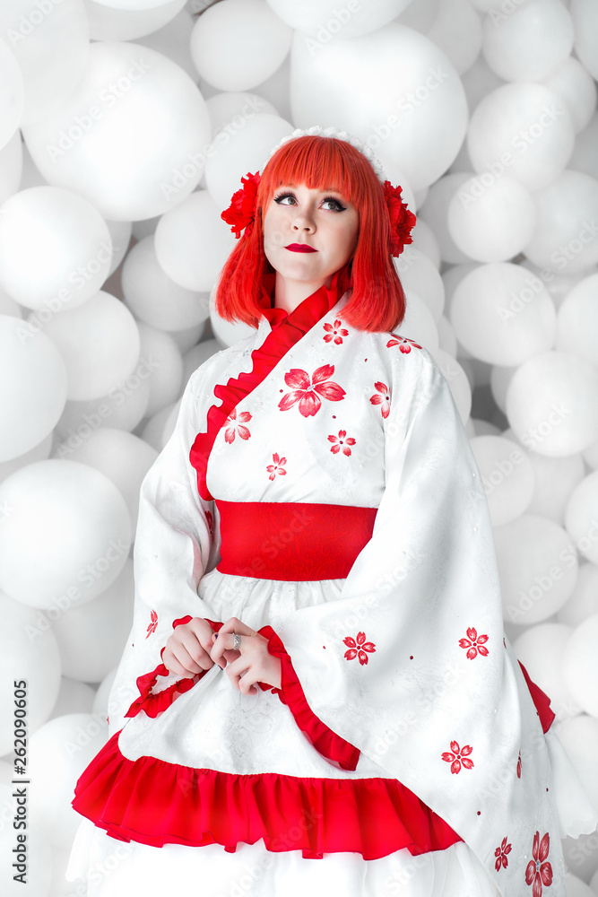 girl in kimano on the background of balls girl in kimano on the background of balls