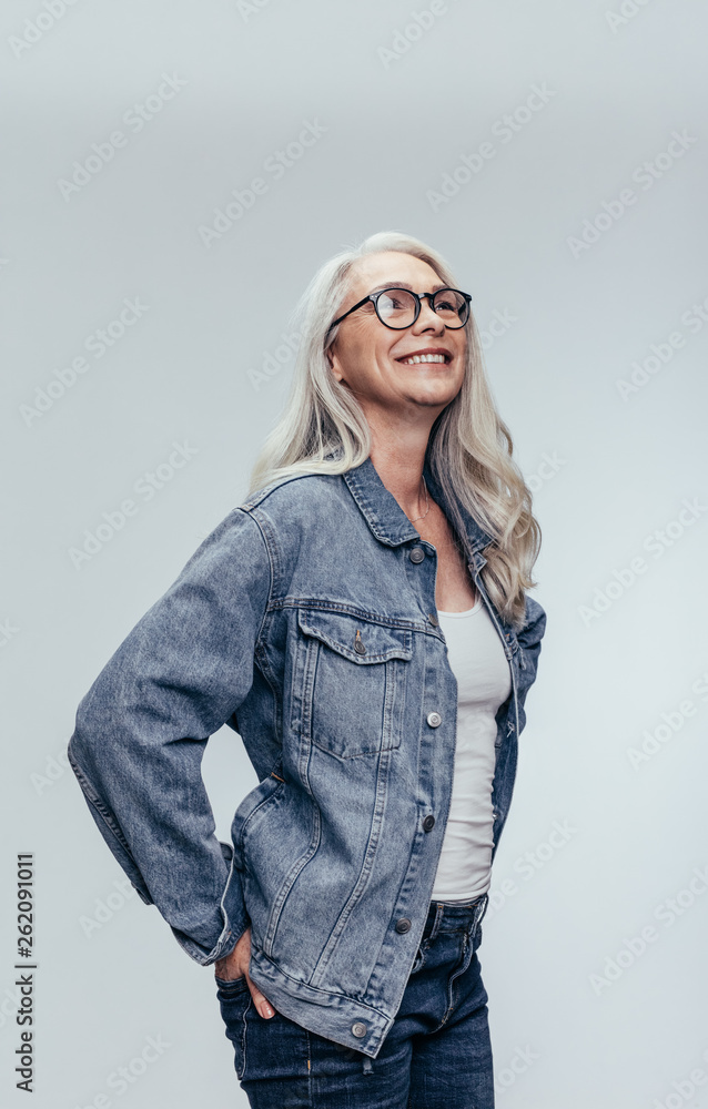 Stylish senior woman looking at copy space Stylish senior woman looking at copy space