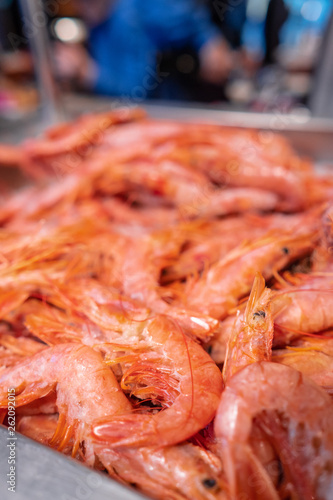 Frozen shrimps on the showcase. Selective focus.