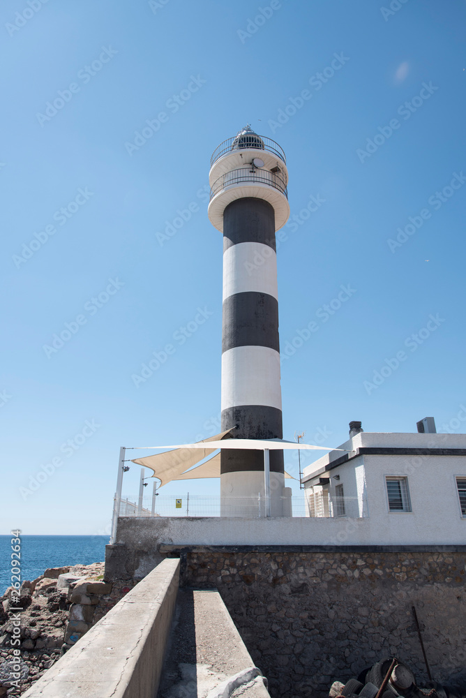  lighthouse and panorama of the port in Aguilas, Spain