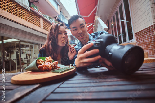 Asian couple enjoy chinese ...