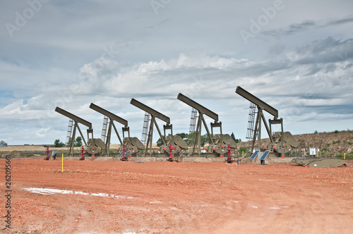 Five pumpjack in a row