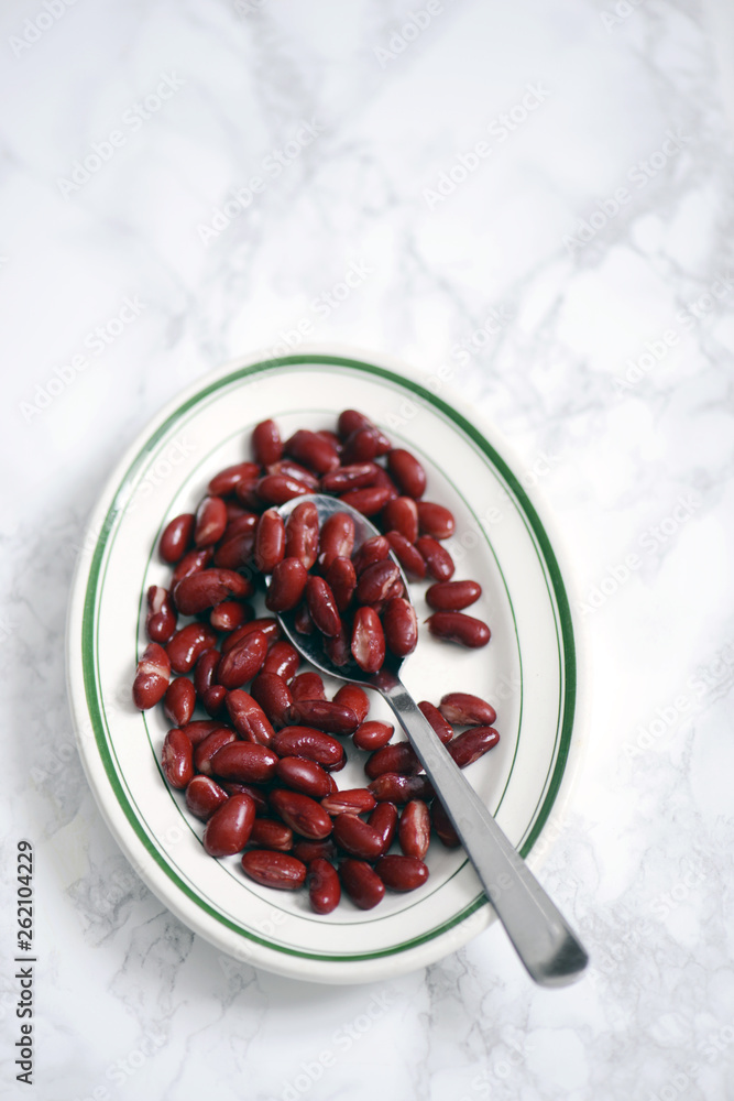 Bowl of kidney beans with spoon Bowl of kidney beans with spoon