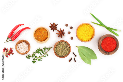Fototapeta Naklejka Na Ścianę i Meble -  mix of spices in wooden bowl isolated on a white background with copy space for your text. Top view. Flat lay. Set or collection